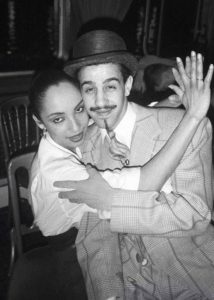A black and white picture of Sade Adu with her ex-husband Robert Elms