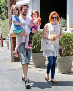 Alyson with her husband Denisof and children
