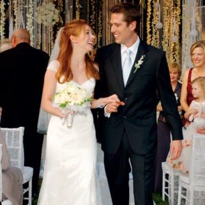  Alyson Hannigan and her partner, Alexis Denisof on their wedding 