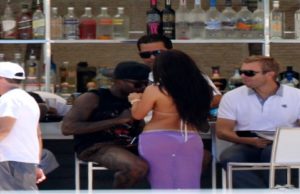 Djibril-Cisse-sipping-cocktails-drinks-with-UK-glamour-model-rosie-roff-where-is-his-wife-jude-cisse-epl
