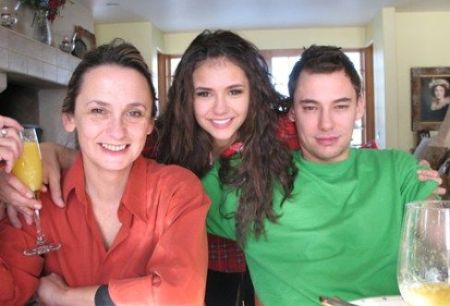 Nina Dobrev with her mother and brother