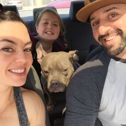Jodi Boam with her boyfriend and his daughter and dog