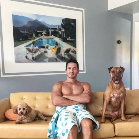 Sasha Roiz at home with his pet dogs