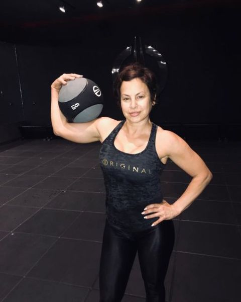 Natalie Raitano holding a gym ball.