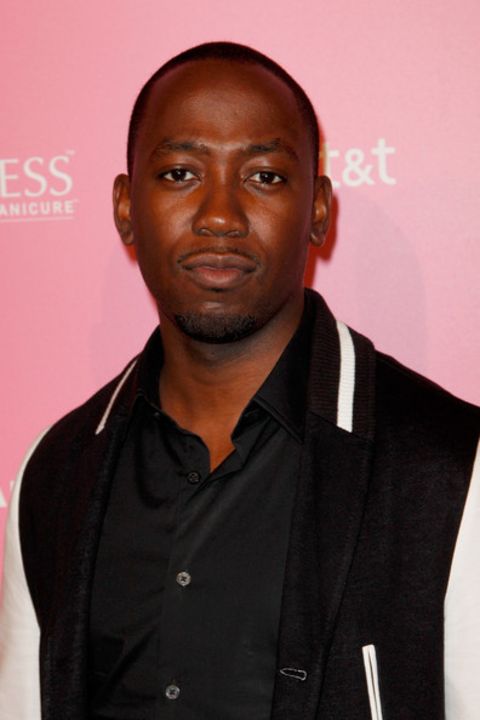 Lamorne Morris giving a pose in an event.