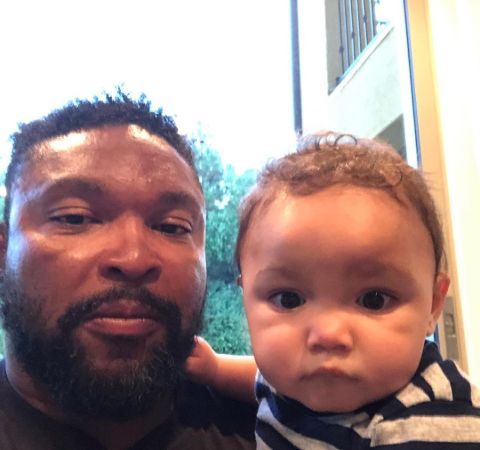 Marlon Byrd poses with his son for a picture.