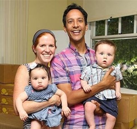 Danny Pudi poses with his wife and children.