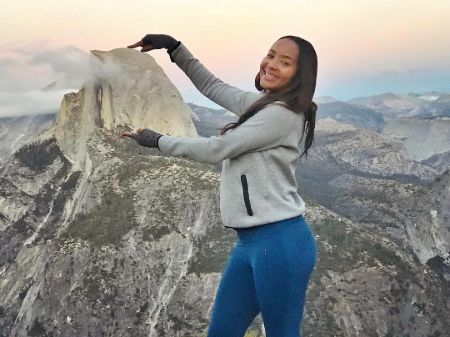 The IG model posing at top of a mountain