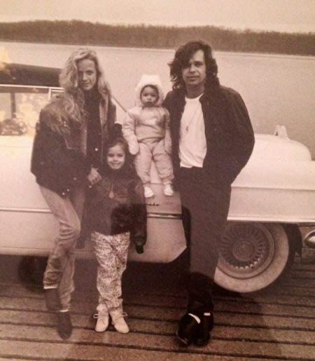 Victoria with her husband, John Mellencamp, and their kids