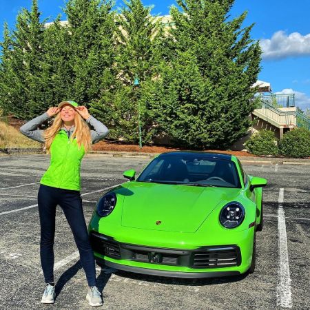 Lucia Oskerova in front of her brand new car