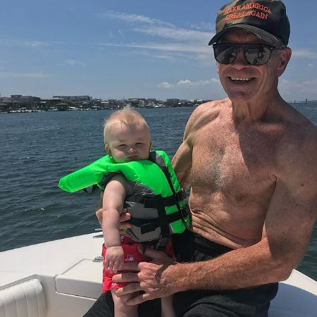 Robert Luke Yunaska with his grandson, luke on a boat.