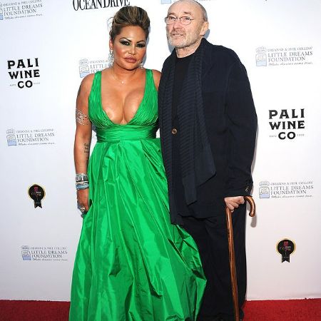   Orianne Cevey with her ex-husband, Phil Collins. 
